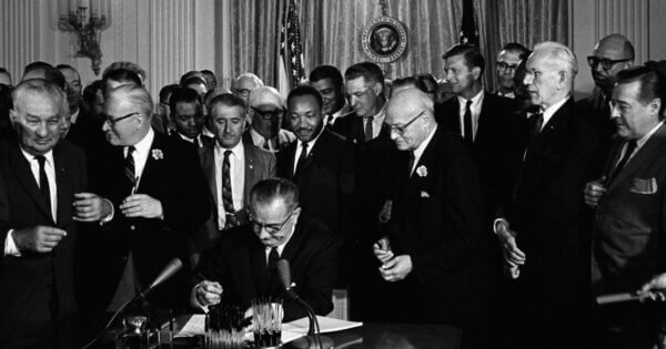 President Johnson signing the Voting Rights Act of 1965 into law