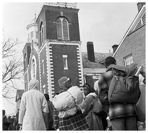 Civil rights marchers in front of Brown Chapel AME Church in Selma, Alabama