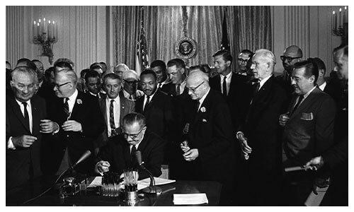 President Johnson signing the Voting Rights Act of 1965 into law.