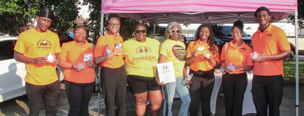 Group of people smiling for a picture at the Selma Juneteenth Celebration